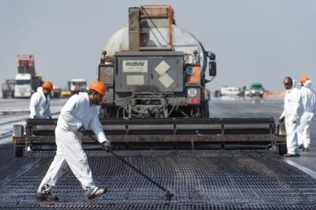 Application of a geogrid on Paris Roissy Charles de Gaulle runway. In this case, the product was a Notex Glass 100x100 geogrid by Afitexinov. Picture courtesy of Colas